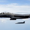 A U.S. Air Force F-15E Strike Eagle flies with a Joint Air-to-Surface Standoff Missile (JASSM). JASSM-Extended Range has more than two-and-a-half times the range of JASSM for greater standoff distance. Photo credit: U.S. Air Force. (PRNewsfoto/Lockheed Martin)