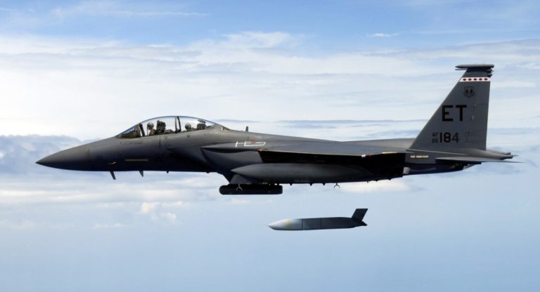 A U.S. Air Force F-15E Strike Eagle flies with a Joint Air-to-Surface Standoff Missile (JASSM). JASSM-Extended Range has more than two-and-a-half times the range of JASSM for greater standoff distance. Photo credit: U.S. Air Force. (PRNewsfoto/Lockheed Martin)