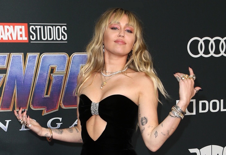 Miley Cyrus is one of several musicians canceling shows because of coronavirus. (Photo: Bang ShowBiz)