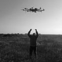 A Ukrainian soldier launches an R-18 drone, used for reconnaissance and bombing Russian positions. (Photo: Аеророзвідка / Aerorozvidka)