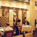 An Indian restaurant with family style French service.