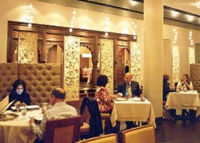 An Indian restaurant with family style French service.