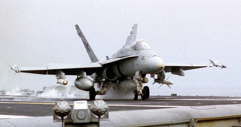 An F/A-18C Hornet launches from the waist catapult during flight operations on board the aircraft carrier USS Nimitz (CVN 68) in the Persian Gulf on Nov. 11, 1997. The Nimitz and embarked Carrier Air Wing 9 are operating in the Persian Gulf in support of the U.S. and coalition enforcement of the no-fly-zone over Southern Iraq. The Hornet is armed with AIM-9 Sidewinder heat-seeking, short-range air-to-air missiles, RIM-7M Sea Sparrow radar-guided air-to-air missiles, Rockeye cluster bombs, and the AGM-88 High Speed Anti-Radiation missile (HARM), used as an air-to-ground weapon to seek out and destroy enemy radar equipped air defense systems. The Hornet is assigned to Strike Fighter Squadron 147, Naval Air Station Lemoore, Calif. DoD photo by Petty Officer 3rd Class Christopher Mobley, U.S. Navy