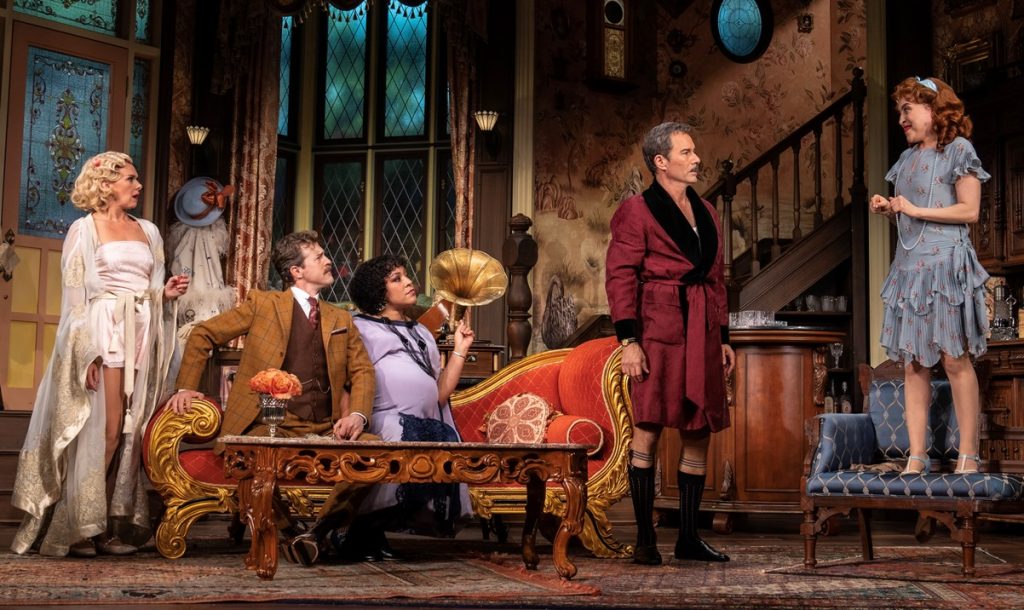 The cast of 'The Cottage,' with Alex Moffat second from left.