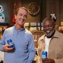 NFL legends Peyton Manning and Emmit Smith are in the game for Bud Light.