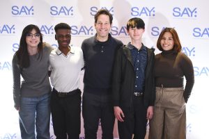 Paul Rudd poses with some of the kids at the SAY foundation event. (Photo: Jason Steinberg)