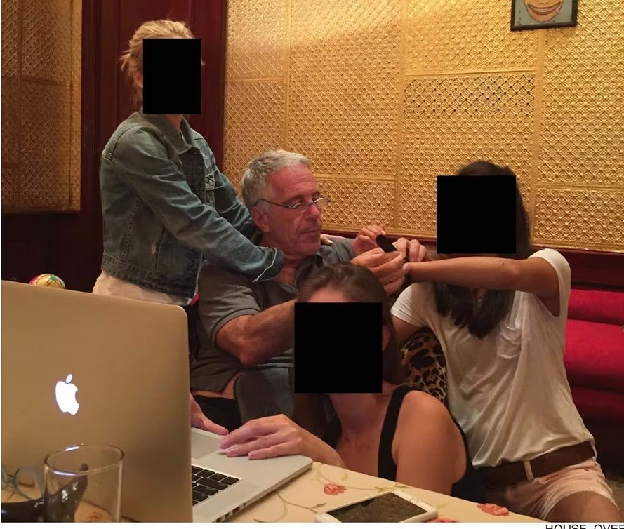 Jeffrey Epstein is pictured with three girls who are presumed to be underage victim and have had their faces redactred. (Photo: HOC)