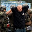 ICE agents detain a person during a sweep in Los Angeles. (Photo: USGovt.)