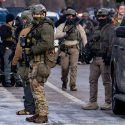 Federal ICE agents congregate on Portland Ave in Minneapolis near where Renee Good was shot to death. (Photo: Chad Davis)