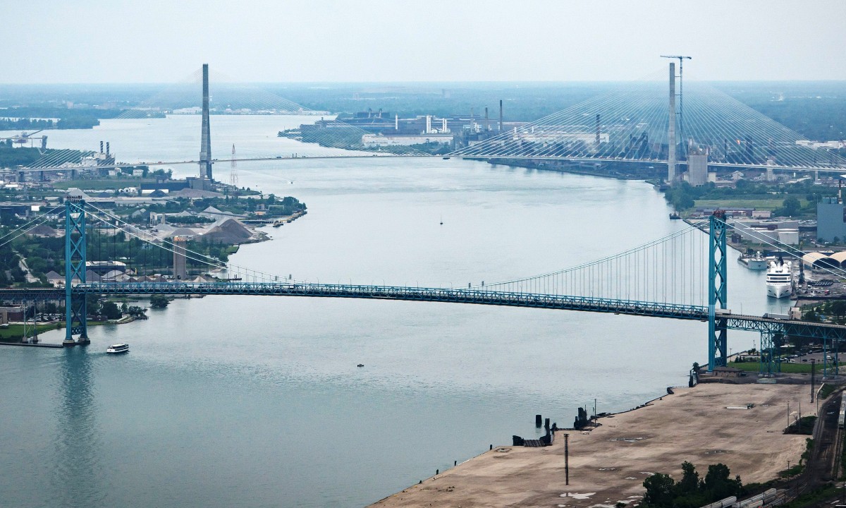 The Gordie Howe International Bridge (background) and the Moroun toll bridge in Detroit. (Photo: DHS)