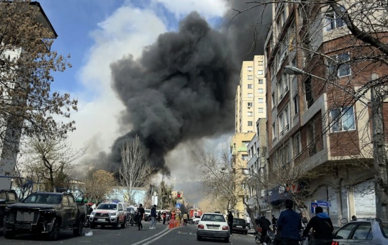 An explosion rocks downtown Tehran, Iran, during the opening salvo of the war. (Photo: Avash)