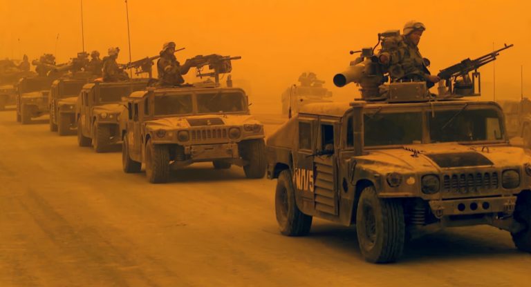 U.S. troops are engulfed by a sandstorm during the 2003 Iraq invasion. Trump is caught in the same trap. (Photo: U.S. Marines)