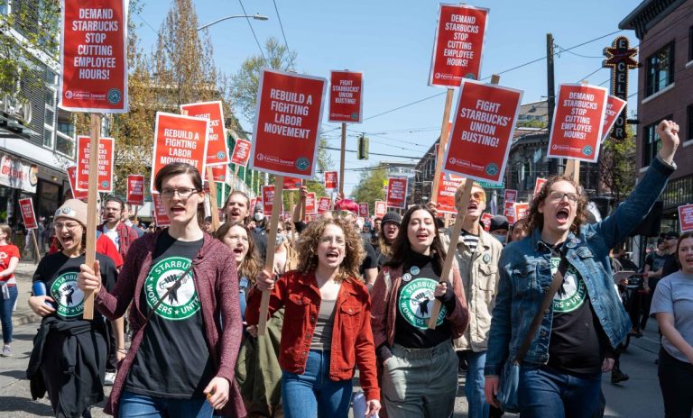 Starbucks workers rally in Seattle in support of a union. (Photo: elliotstoller)