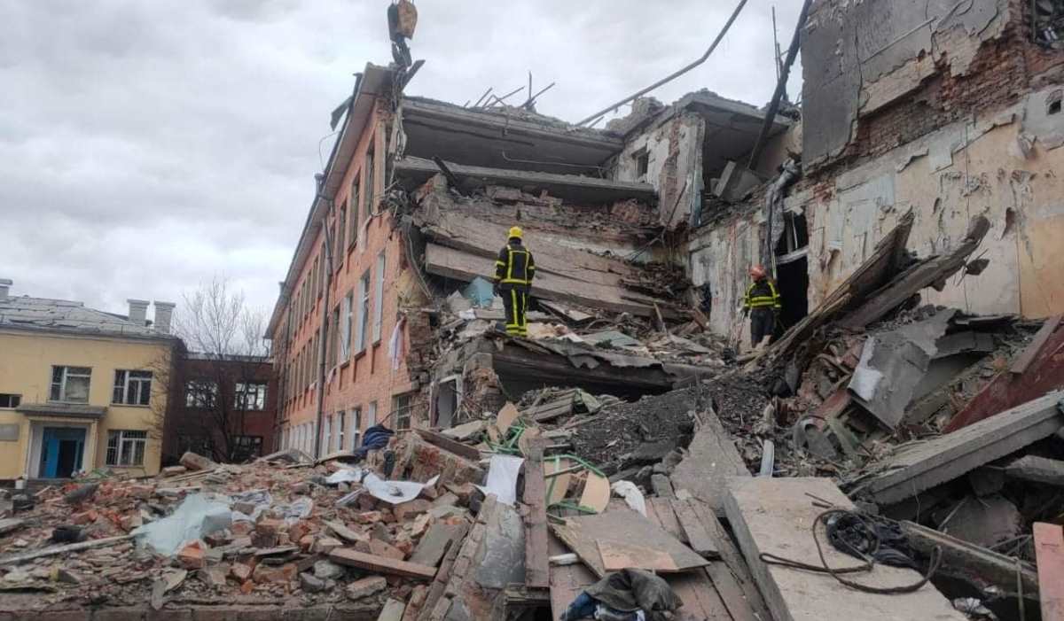Ukrainian rescuers check a destroyed residential building for survivors in Chernigiv. (Photo: mvs.gov.ua.)
