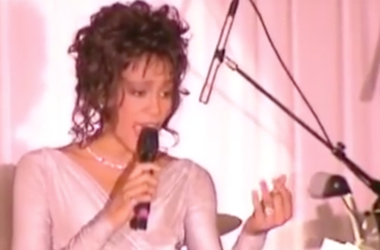 Houston performing at a state dinner in the White House honoring then-South African president Nelson Mandela in 1994