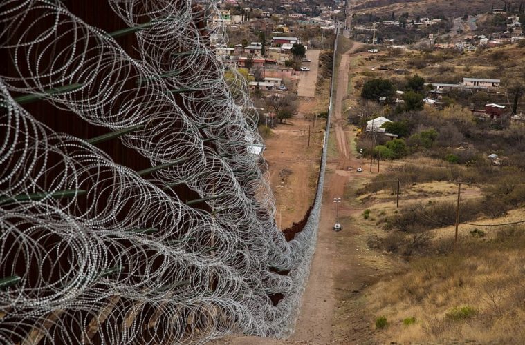 Layers of Constantinia are added to existing barrier infrastructure along the U.S. - Mexico border near Nogales, AZ, on February 4, 2019. Photo: Robert Bushell