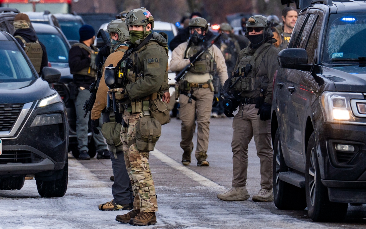 Federal ICE agents congregate on Portland Ave in Minneapolis near where Renee Good was shot to death. (Photo: Chad Davis)